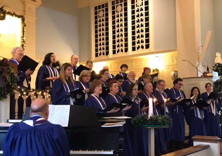 The First Presby choir singing at the front of the sanctuary